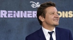 Jeremy Renner, the host and executive producer of 'Rennervations,' poses at the premiere of the four-part Disney+ docuseries, Tuesday, April 11, 2023, at the Westwood Regency Village Theatre in Los Angeles. (AP Photo/Chris Pizzello)