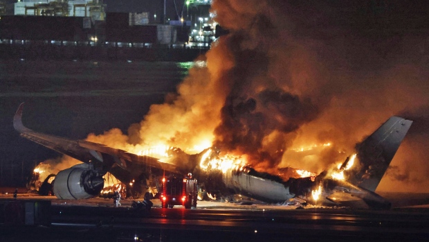 A Japan Airlines plane is on fire on the runway of Haneda Airport on Tuesday, Jan. 2, 2024 in Tokyo, Japan. (Kyodo News via AP)