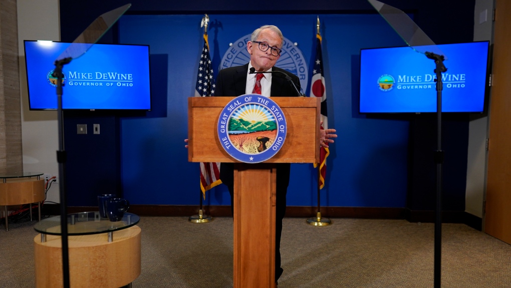 Ohio Gov. Mike DeWine apses as he speaks during a news conference, Friday, Dec. 29, 2023, in Columbus, Ohio. DeWine vetoed a measure Friday that would have banned gender-affirming care for minors and transgender athletes’ participation in girls and women’s sports, in a break from members of his party who championed the legislation. (AP Photo/Carolyn Kaster)
