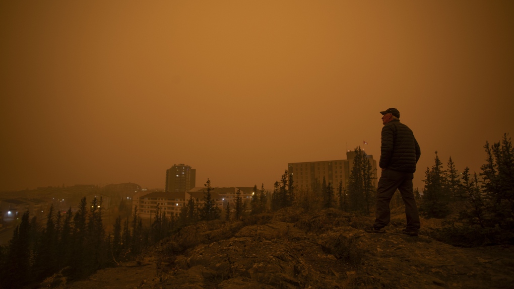 Heavy smoke from wildfires in northern Alberta and British Columbia fill the air at 9 a.m. in Yellowknife, Northwest Territories on Saturday, Sept. 23, 2023. THE CANADIAN PRESS/Bill Braden